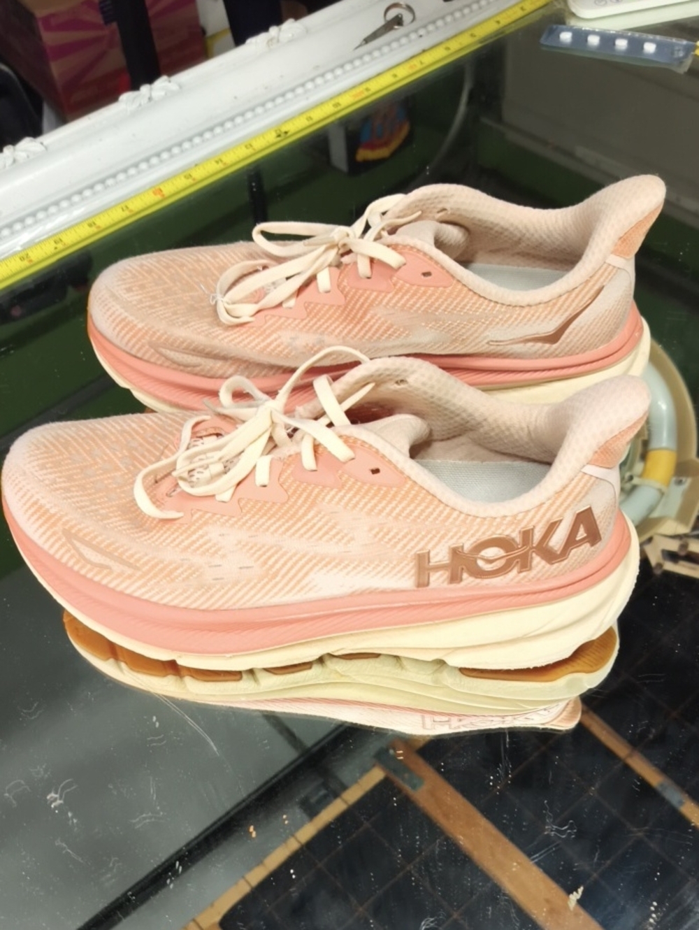 HOKA Women's 10 peach and sandstone HOKA Clifton 9 running shoes